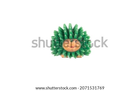 toy plastic hedgehog isolated on white background