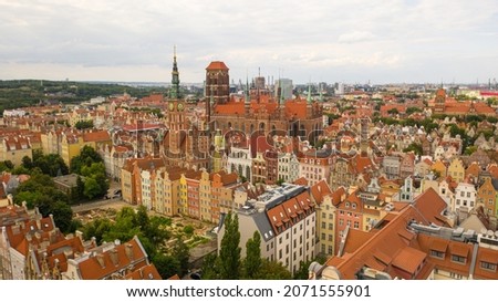 Gdansk, Poland,Europe. Beautiful panoramic aerial photo from drone to old city Gdansk, Motlawa river and Gothic St Mary church, city hall tower, the oldest medieval port crane (Zuraw) and old houses.