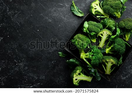 Vegetables. Fresh green broccoli on a table.Broccoli vegetable is full of vitamin. Rustic style. Top view. Royalty-Free Stock Photo #2071575824
