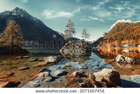 Wonderful Sunny scenery. Splendid mountain landscape. Scenic image of fairy-tale Hintersee lake of summer. Popular travel and hiking destination. Picture of wild area. Awesome Background of nature