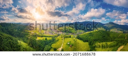 Carpathian mountains summer landscape, seasonal natural background with green hills, blue sky and white clouds. Panoramic view Royalty-Free Stock Photo #2071688678