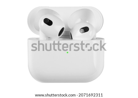 White wireless headphones with no background. Isolated Royalty-Free Stock Photo #2071692311