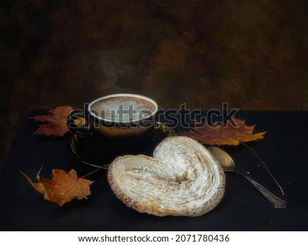 A cup of coffee on a table