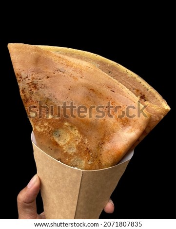 Delicious shredded pork crepes in Thailand, isolated on a black background Suitable for all applications. no focus