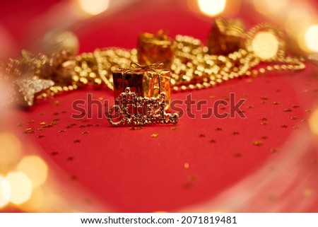 Golden christmas decorations on red background. Christmas New year or party banner