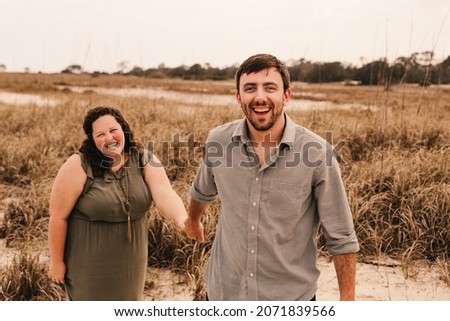 A young married couple on the beach in Florida