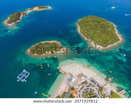 Aero Photography. View from a flying drone. Panoramic view of Ksamil, Albanian Riviera. Ksamil islands are located near the Saranda. Top View. Beautiful destinations.
