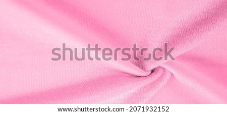 Pink wool, wool from a sheep, goat or similar animal, especially when used in the manufacture of fabric or yarn. Background texture, pattern,