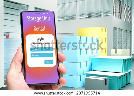 Storage unit apps interface. Rental Storage Units text in phone. Warehouse container search application. Concept authorization renting warehouse. Hand with phones on background storage Unit and box