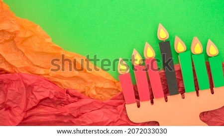 Happy Kwanzaa Greeting Card Background. Candleholder made from paper leaves. Paper art concept, Banner mockup