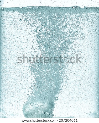 effervescent dissolving fizzy tablet in a water