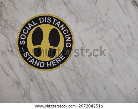 Social Distancing stiker on the floor 