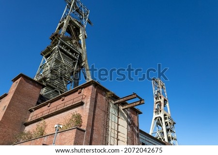 Headstocks of clipstone colliery No 1, is 67m and headstock No 2, is 65.5m high, photographed with not a cloud in the sky Royalty-Free Stock Photo #2072042675