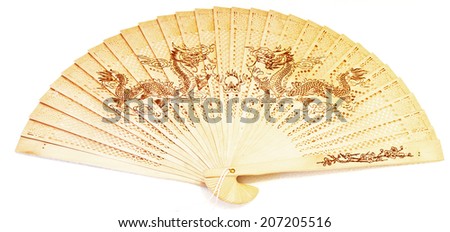 Beautiful photos of vintage wooden Chinese fan with dragon.