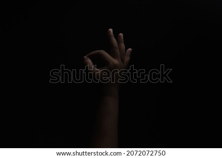 hand gestures - ok sign from darkness