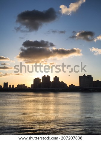 City silhouette panorama at sunset