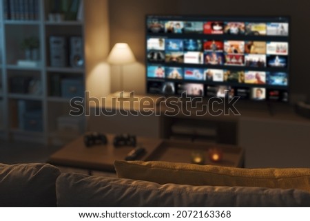 Living room interior and Video on Demand service on smart TV