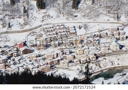 Winter view of the alpine village Carona. Ski resort in Valbrembana, Italy Royalty-Free Stock Photo #2072172524