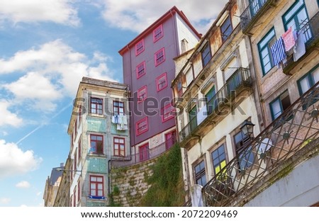 Beautiful old houses in the city center on Rua Mouzinho da Silveira street. Porto, Portugal.