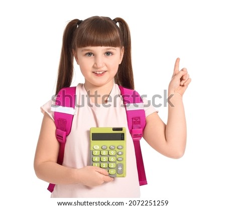Little schoolgirl with calculator and raised index finger on white background