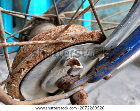 close up old bike with rusty drum brakes