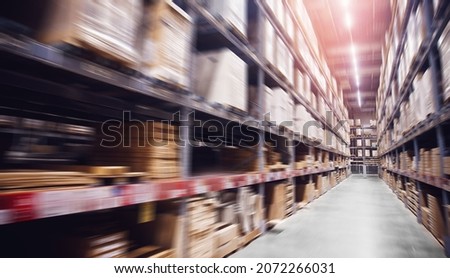 Move Blur background photo logistic center of warehouse with carton box retail stock with sunlight.