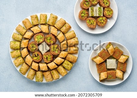 Traditional turkish, arabic dessert baklava assortment with pistachio. Ramadan sweets. Top view, copy space Royalty-Free Stock Photo #2072305709