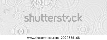 Water background. Blue water texture, blue mint water surface with rings and ripple. Spa concept background. Flat lay, top view, copy space, copy-space, place for text. Royalty-Free Stock Photo #2072366168