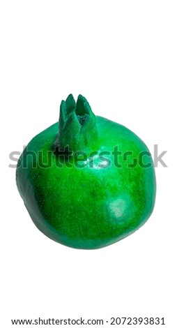 Fun vertical image of a green garnet for bloggers publications on social networks. Healthy lifestyle and proper nutrition. Isolated.