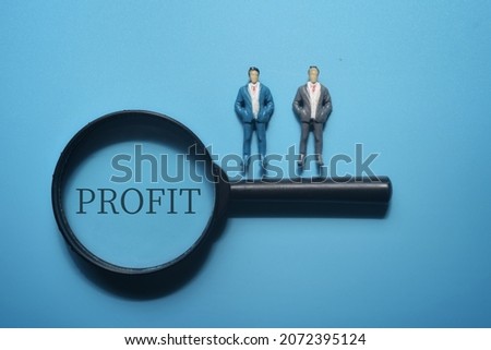 Magnifient glass with Profit wording. Business concept
