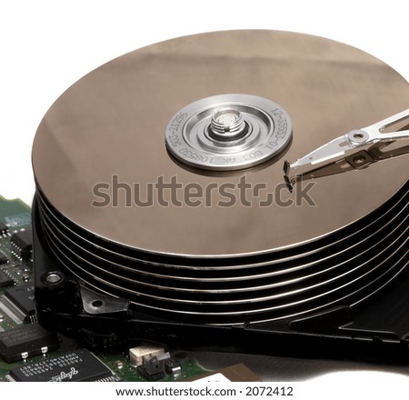 Macro of Opened Hard Disk Drive Isolated on White