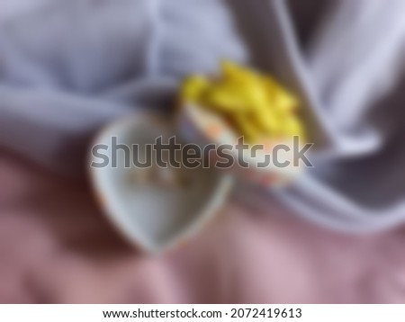 Defocused abstract background of beautiful ring box.