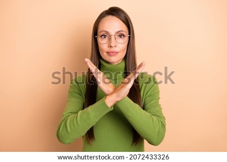 Photo of mature bossy lady show no wear eyewear green sweater isolated on beige color background