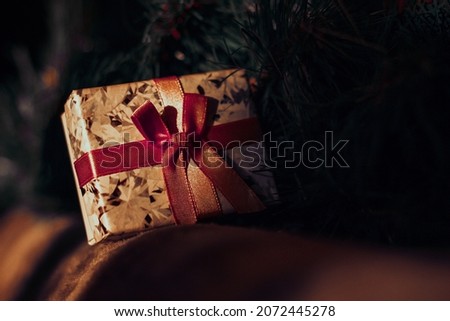 Christmas gift box under christmas tree