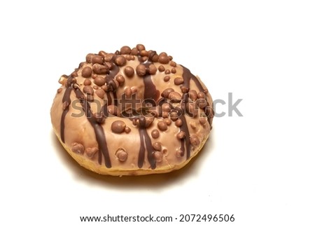 Delicious donut with caramel glazed, Isolated on white background. High quality photo Royalty-Free Stock Photo #2072496506