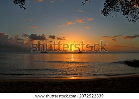 Brilliant Sunset off the coast of Batt's Rock on the West Coast of Barbados. Royalty-Free Stock Photo #2072522339