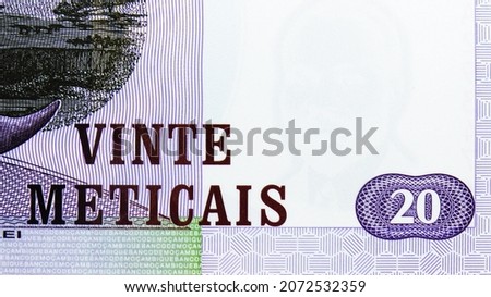 20 Meticais polymer banknote, Bank of Mozambique, closeup bill fragment shows Face value and watermark, issued 2011