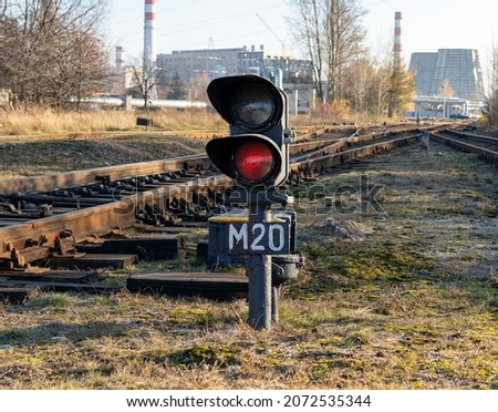 The railway traffic light is red. Train traffic warning. Railways.
