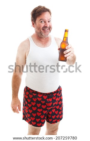 Scruffy middle aged man in his underwear offering you a bottle of beer.  Isolated on white.  