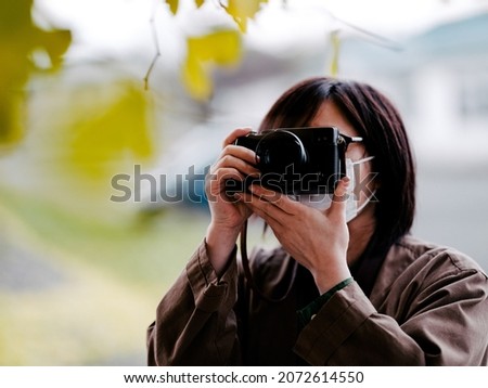People who shoot autumn leaves