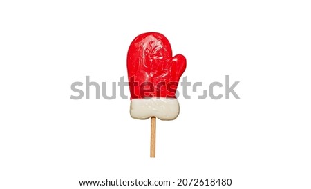 Christmas Lollipop Isolated White Background Traditional New Year Candy Santa's mitten lollipop.