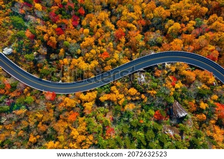 Road through the Blue Ridge Parkway mountains of North Carolina during the Fall. Royalty-Free Stock Photo #2072632523