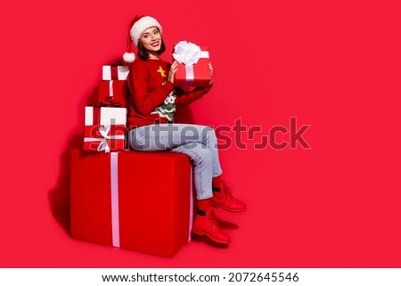 Full body profile side photo of youth lady gift ads shopping advent magic isolated over red color background