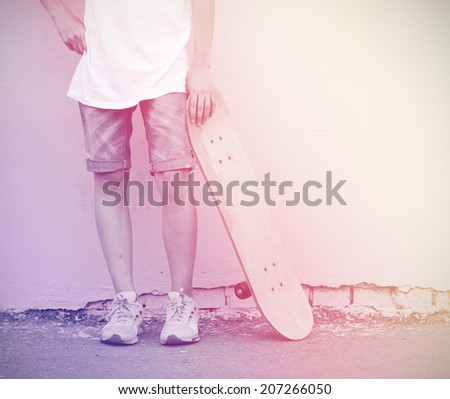 boy with skateboard vintage photo retro style