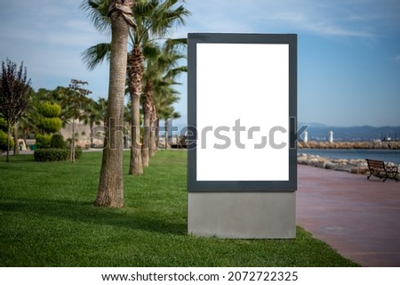 Mockup Billboard with white Blank space. billboard outdoors, outdoor advertising, public information placeholder board near the beach sea