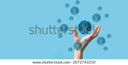 Businessman holding on hand icon of user man,woman low poly polygon style. Internet icons interface foreground. global network media concept Royalty-Free Stock Photo #2072743250