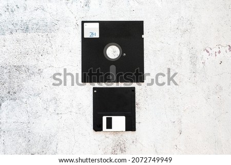 5.25 and 3.5 inch Floppy disk placed side by side