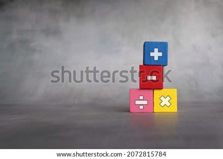 Mathematical symbols and education concept. Wooden blocks with mathematical symbols. Copy space for text. Royalty-Free Stock Photo #2072815784