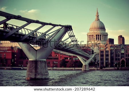 St Paul's cathedral in London and bridge over Thames River. 