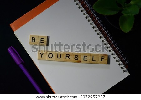 Be yourself, text words typography on wooden background, life and business motivational inspirational concept